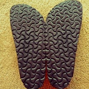 Black oiled leather clogs